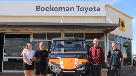 Competition winners Yvonne Meares (left) and Scott Mauger, Winnejup, Boekeman Machinery group sales manager Ben Boekeman and Boekeman Toyota general manager Matt Read with the Landboss 800D vehicle.